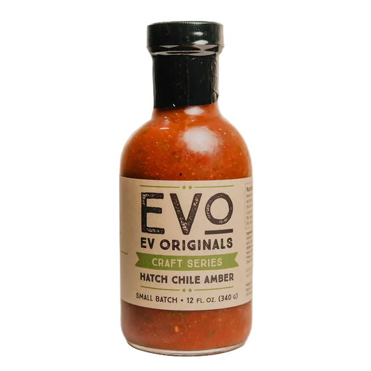 Bottle of Evo Originals Hatch Chile Amber sauce on a white background